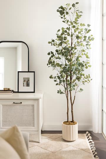 Kate and Laurel 8ft. Green Eudora Faux Eucalyptus Tree in White Planter